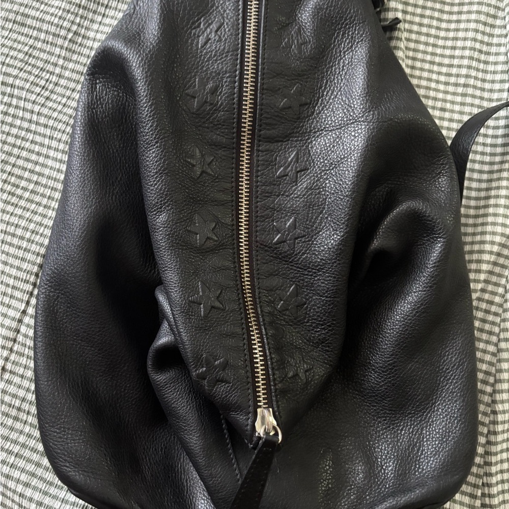 Elegant Black Star-Patterned Leather Backpack